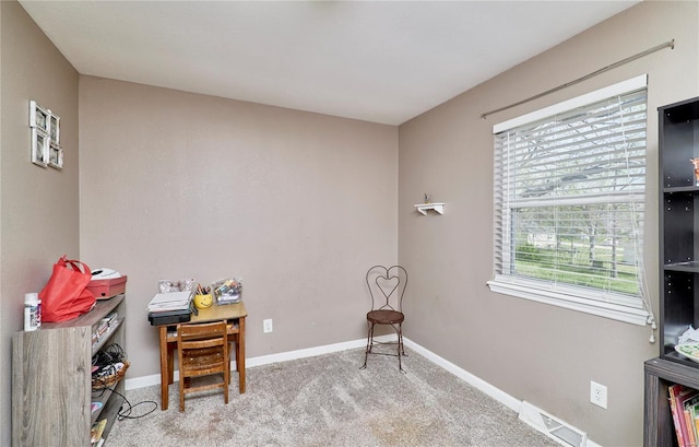 sitting room featuring visible vents, baseboards, and carpet