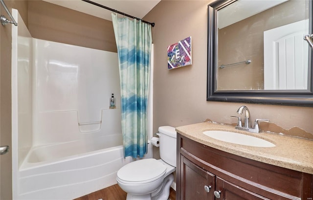 full bath featuring toilet, vanity, and shower / bath combination with curtain