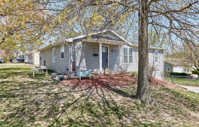 view of front of home with fence
