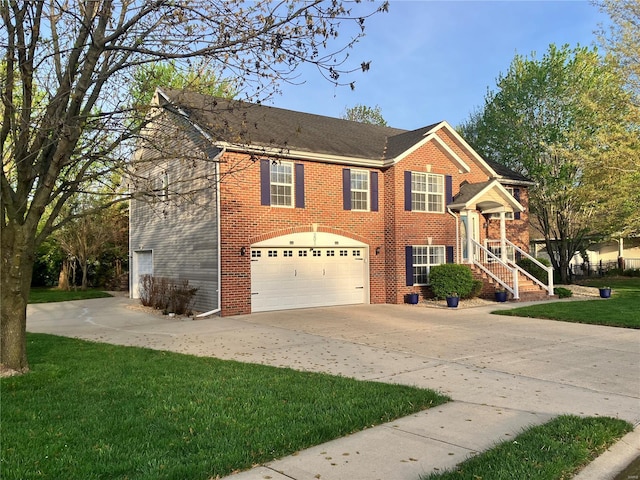 view of front of home with concrete driveway, brick siding, an attached garage, and a front lawn
