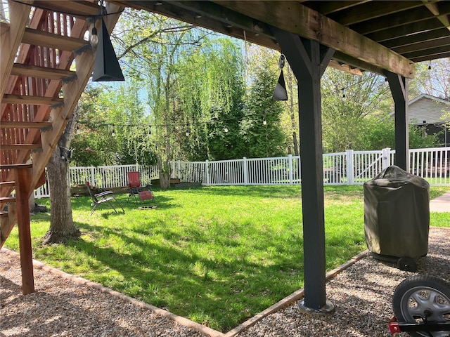 view of yard with a fenced backyard