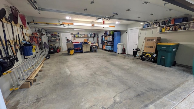 garage with a workshop area