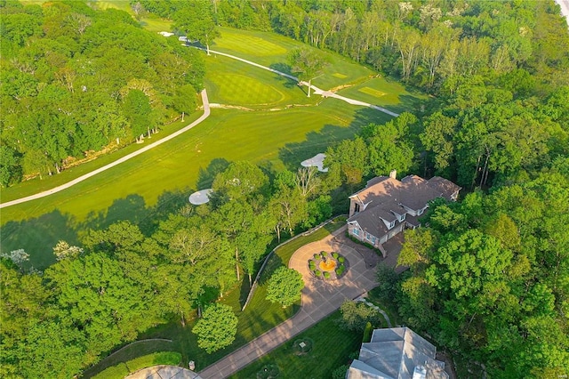 drone / aerial view with a water view and a wooded view