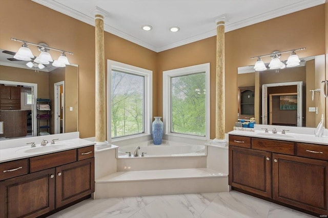 full bathroom with crown molding, a sink, marble finish floor, two vanities, and a garden tub