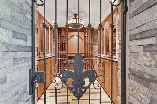 wine room with recessed lighting