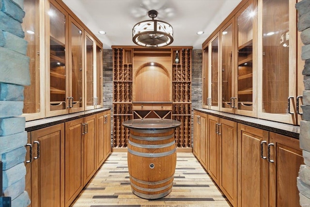 wine cellar featuring recessed lighting and light wood-style flooring