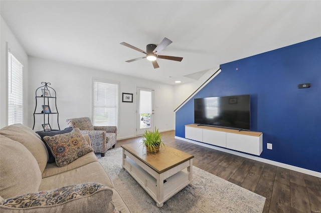 living area featuring baseboards, a ceiling fan, wood finished floors, and recessed lighting