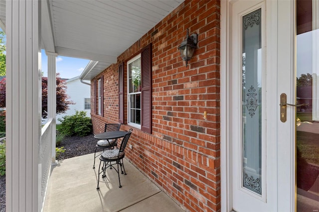 view of patio featuring a porch