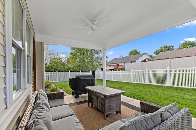view of patio featuring outdoor lounge area, a ceiling fan, and grilling area