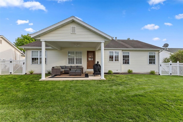 rear view of house with a gate, an outdoor living space, a patio, and ceiling fan