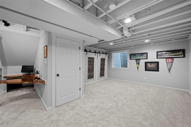 basement featuring baseboards and carpet