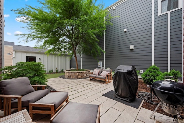 view of patio featuring an outdoor hangout area and a grill