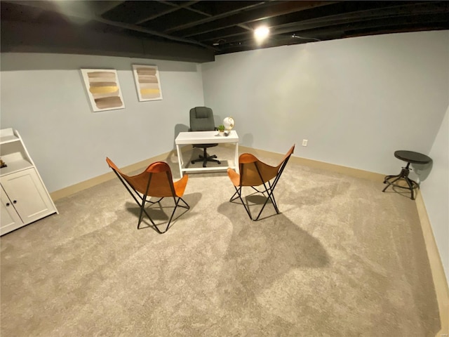 interior space with light carpet and baseboards