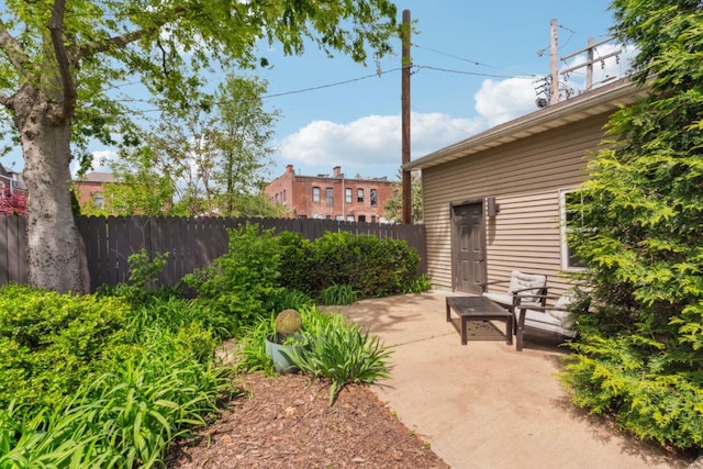 exterior space featuring fence and a patio area