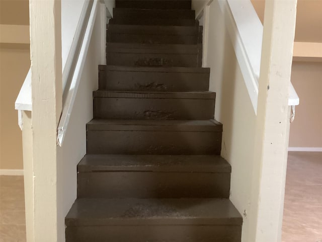 stairway with baseboards
