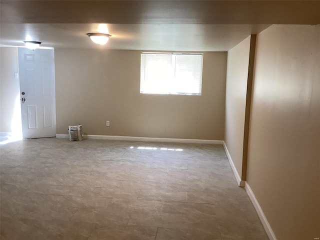 empty room with baseboards