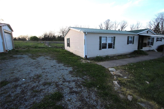 view of home's exterior featuring metal roof