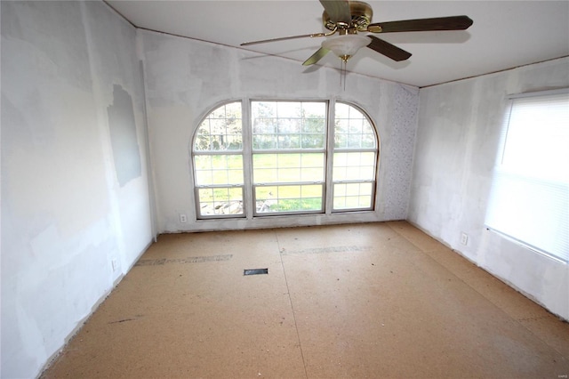spare room featuring a ceiling fan