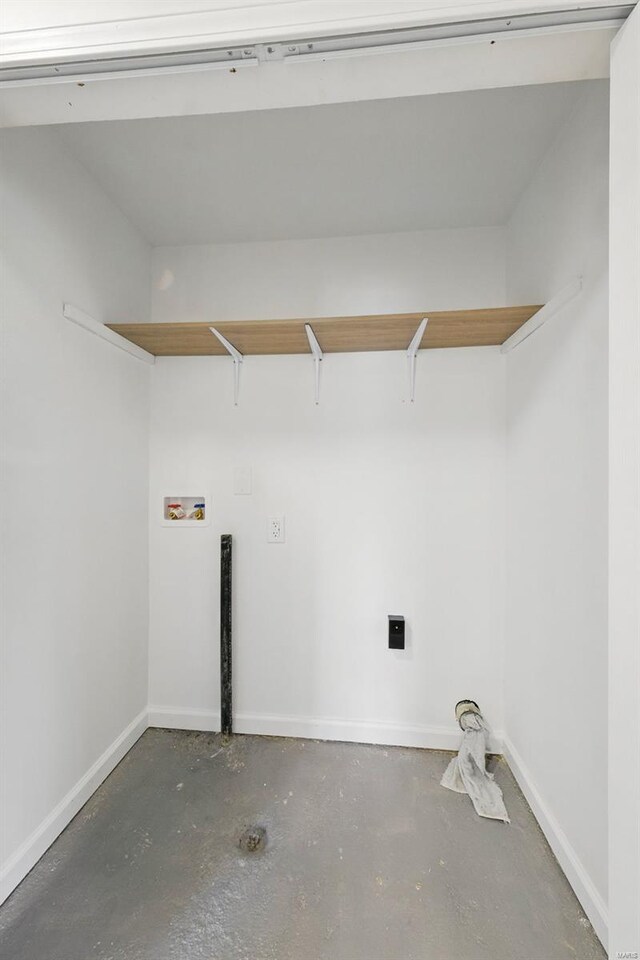 washroom with hookup for an electric dryer, washer hookup, laundry area, and baseboards