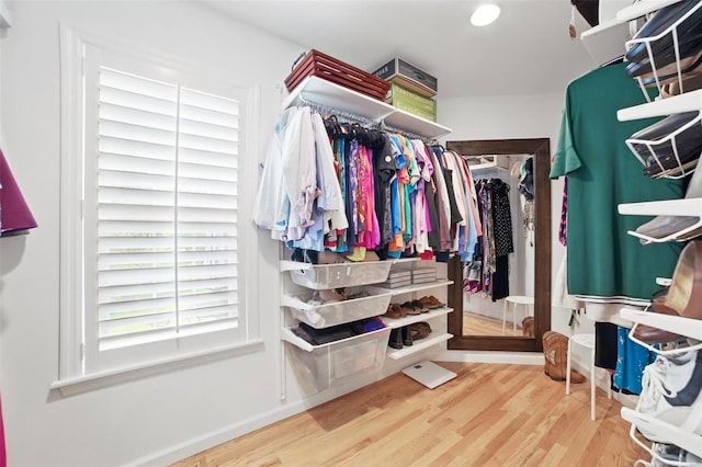 spacious closet with wood finished floors