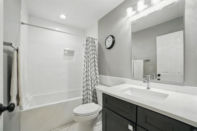 bathroom with shower / bath combo with shower curtain, toilet, tile patterned flooring, and vanity