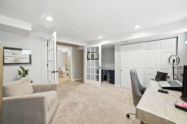 office area featuring french doors, recessed lighting, baseboards, and light carpet