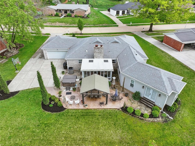 drone / aerial view featuring a residential view