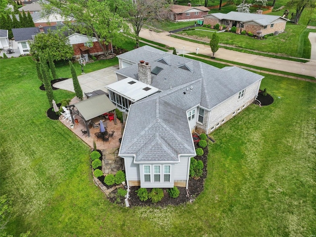 drone / aerial view with a residential view