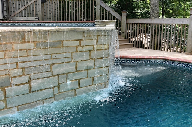 outdoor pool with stairs