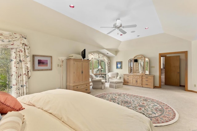 bedroom featuring lofted ceiling, ceiling fan, and light colored carpet