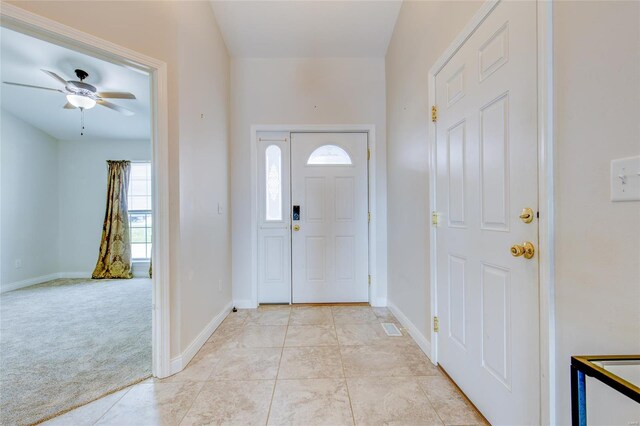 entrance foyer featuring a wealth of natural light and baseboards