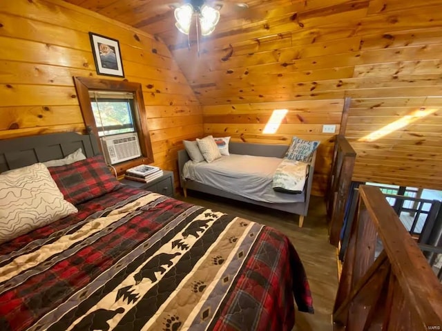 bedroom with wood walls, wood finished floors, and cooling unit