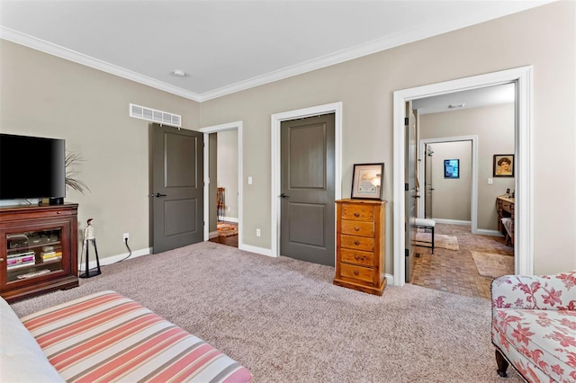 carpeted bedroom featuring visible vents, crown molding, and baseboards