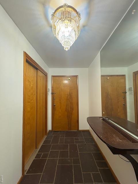 hall with a chandelier