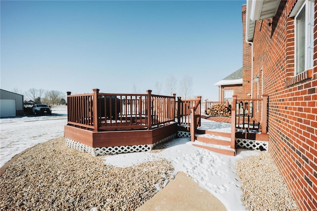 view of snow covered deck