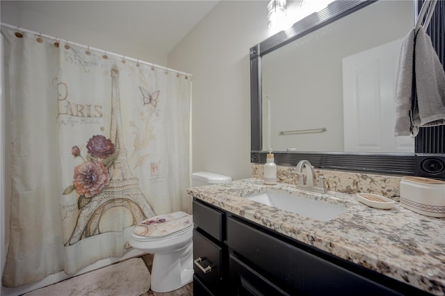 full bath featuring toilet, wood finished floors, and vanity