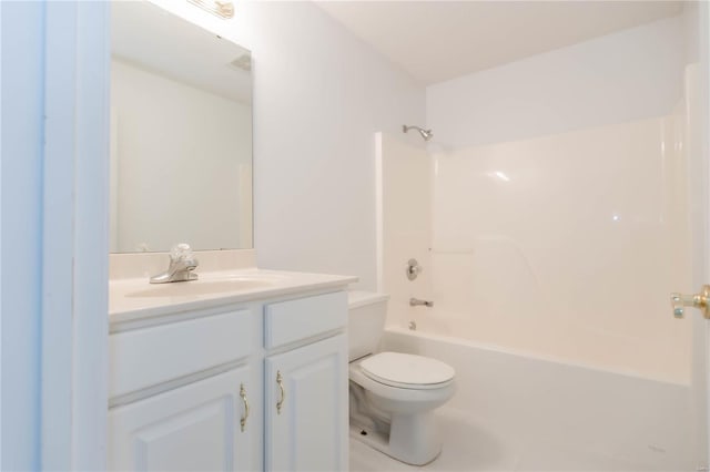 full bath with toilet, vanity, and tub / shower combination