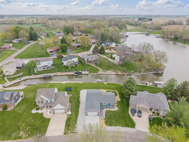 aerial view with a residential view and a water view