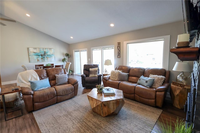 living room with vaulted ceiling, wood finished floors, recessed lighting, and ceiling fan