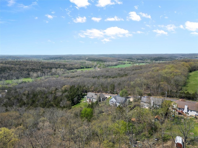 aerial view with a wooded view