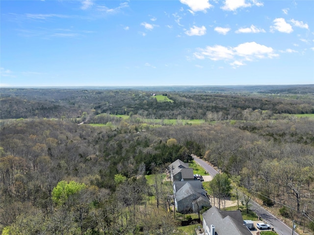 bird's eye view featuring a view of trees