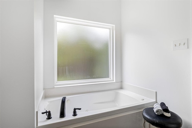 bathroom featuring a garden tub