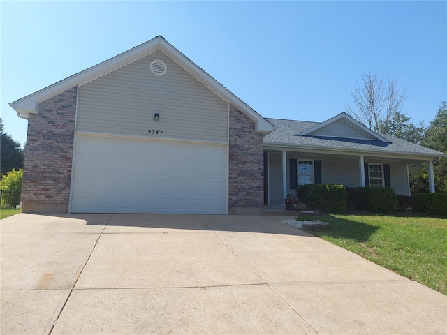 ranch-style house with a garage, driveway, covered porch, a front yard, and brick siding