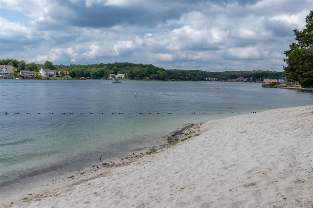 property view of water featuring a view of the beach