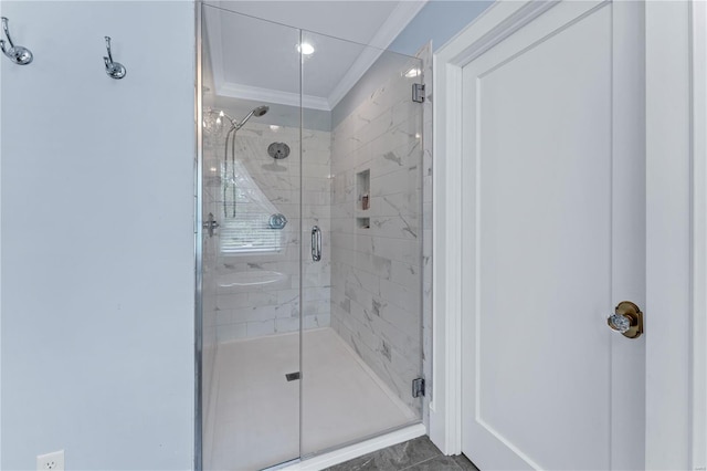 full bathroom featuring crown molding and a stall shower
