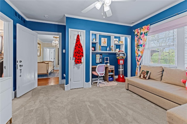 interior space featuring crown molding, carpet, ceiling fan with notable chandelier, and visible vents