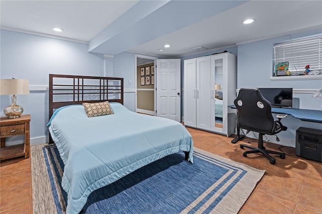 bedroom featuring tile patterned floors and recessed lighting