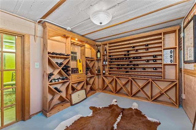 wine room with concrete flooring