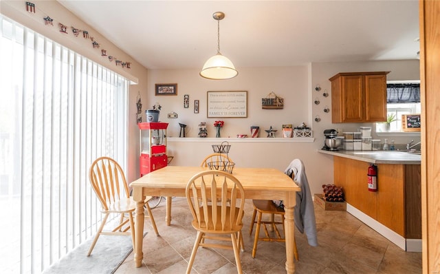 dining room featuring light tile patterned flooring
