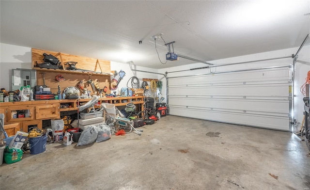 garage featuring a garage door opener